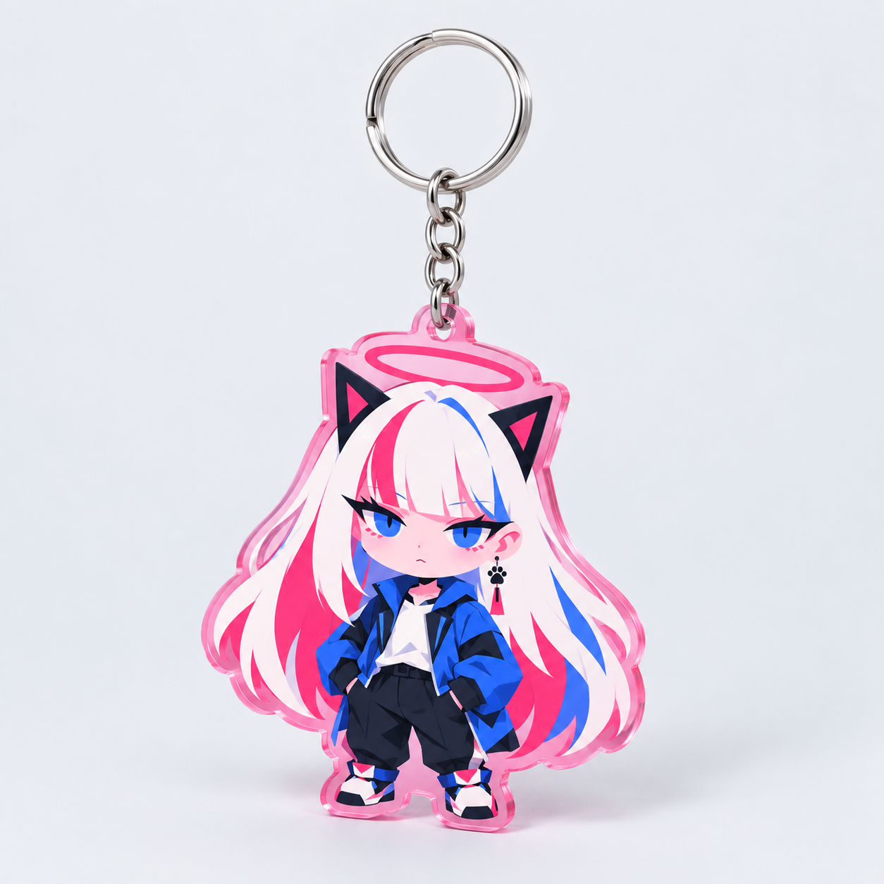 Pink acrylic charm with a tiny chibi MUA in a blue windbreaker.